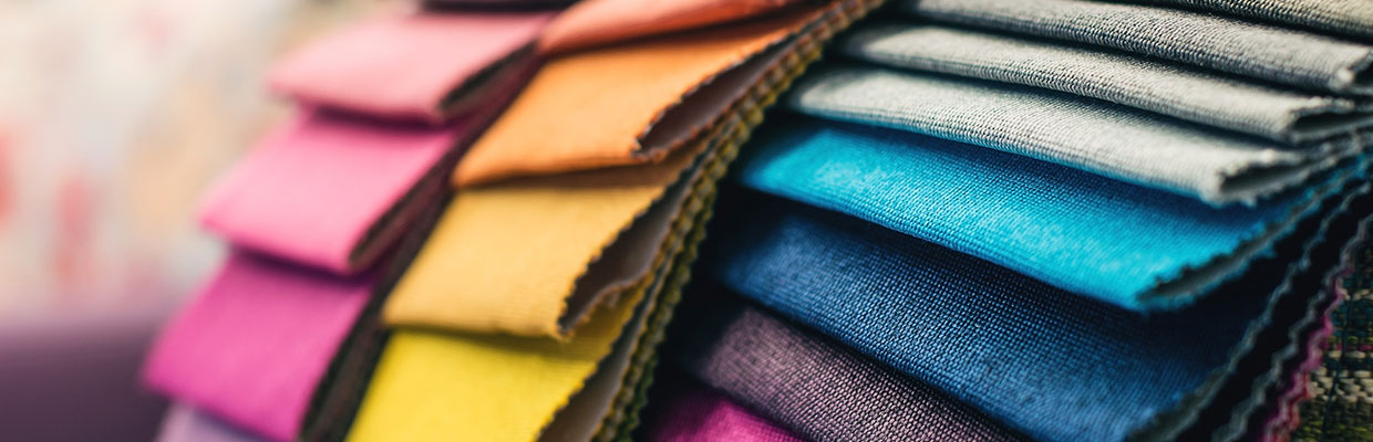 Colorful cotton fabric in the clothes shop; image used for HSBC Fusion Malaysia Products and services page