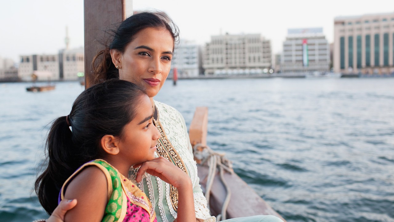 Mother and daughter are enjoying the river view; image used for HSBC Malaysia spend wisely article page.