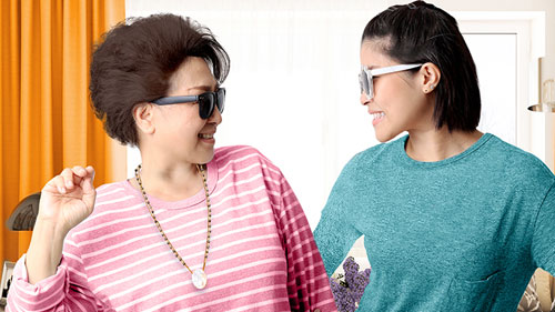 A mother and daughter are smiling together; image used for HSBC Malaysia offers