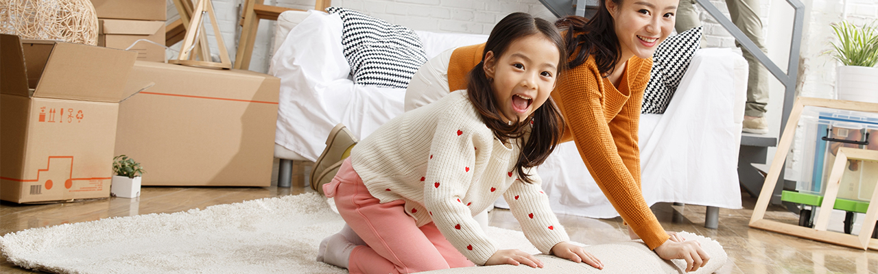 A mother and daughter are decorating an apartment; image used for HSBC Malaysia Mortages