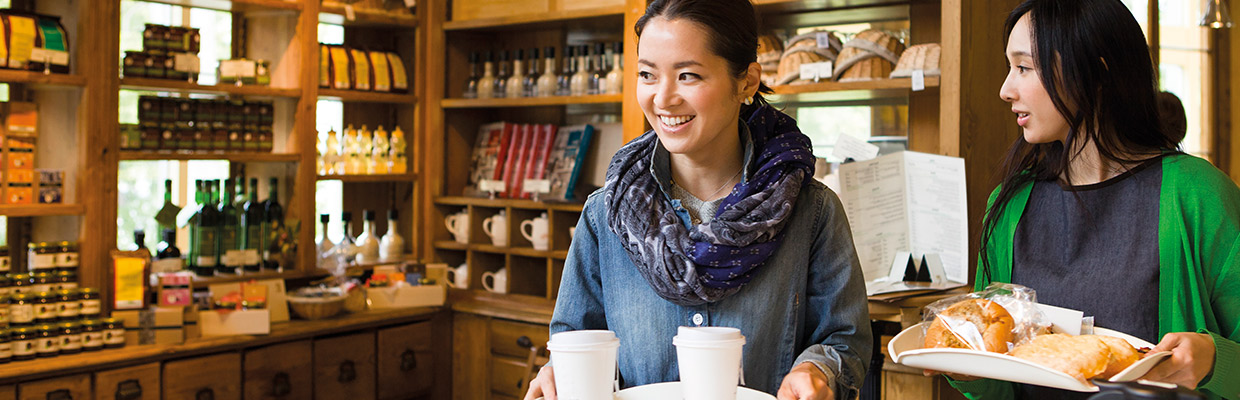 Two women are in a bakery; image used for HSBC Malaysia Advance Visa Platinum Credit Card