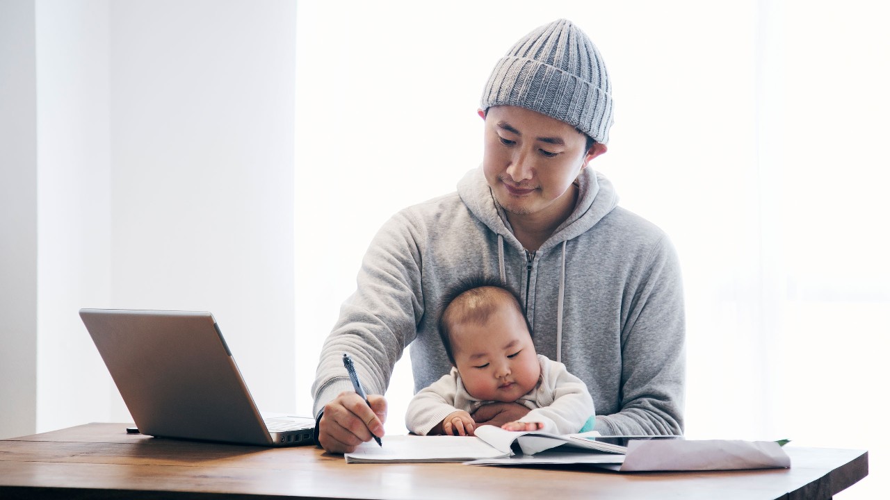 Father and baby working together; image used for HSBC MY why saving is important article page