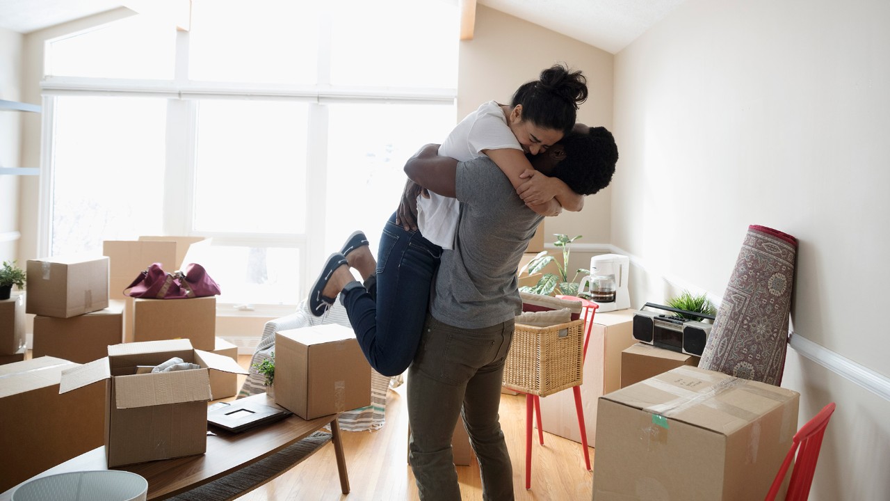 A man and woman hugging; image used for HSBC Malaysia First Home Mortgage