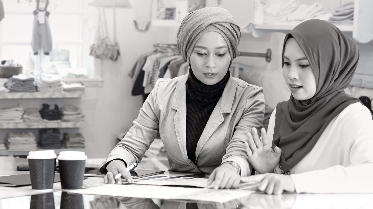 Ladies discussing business; image used for HSBC Malaysia Fusion Homepage.