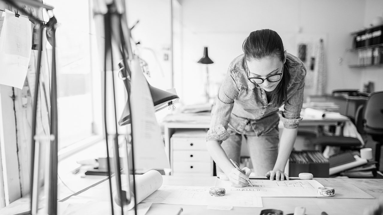 A woman drawing pictures in studio; image used for HSBC Malaysia Fusion Homepage.