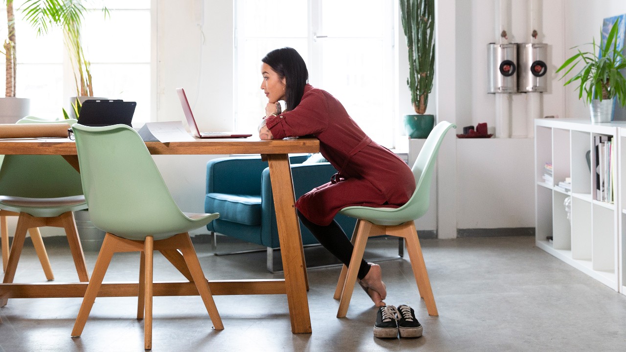 A woman using her laptop ; image used for HSBC Fusion Malaysia homepage